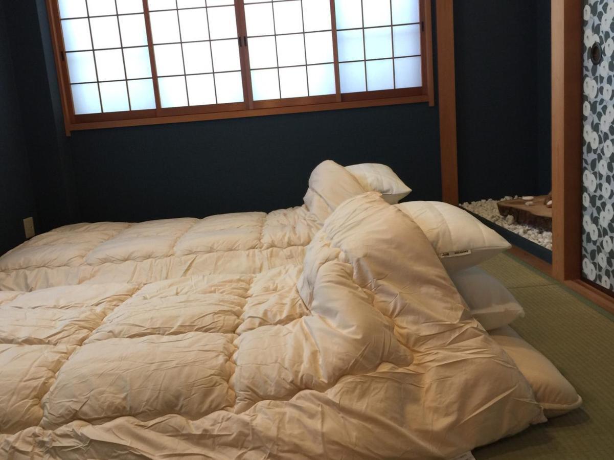 Yumeji Guest House Osaka Buitenkant foto